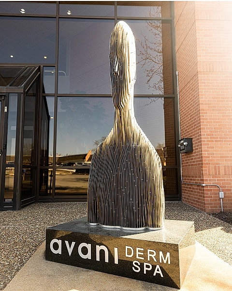 Sculpture outside Avani Derm Spa entrance.
