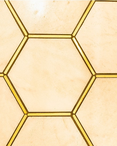 Abstract texture with beige and gold patterns.