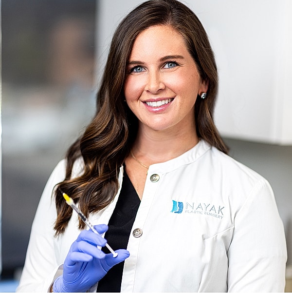 St. Louis Med Spa provider with syringe in plastic surgery office.