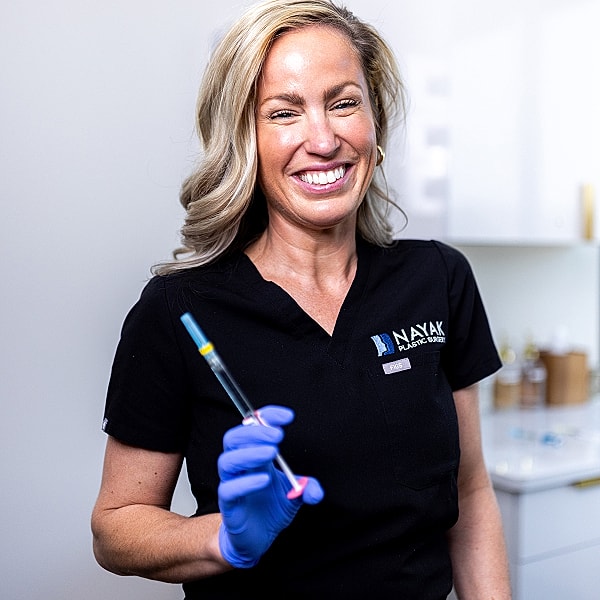 St. Louis Medical Spa  performing treatment in a clinical setting.