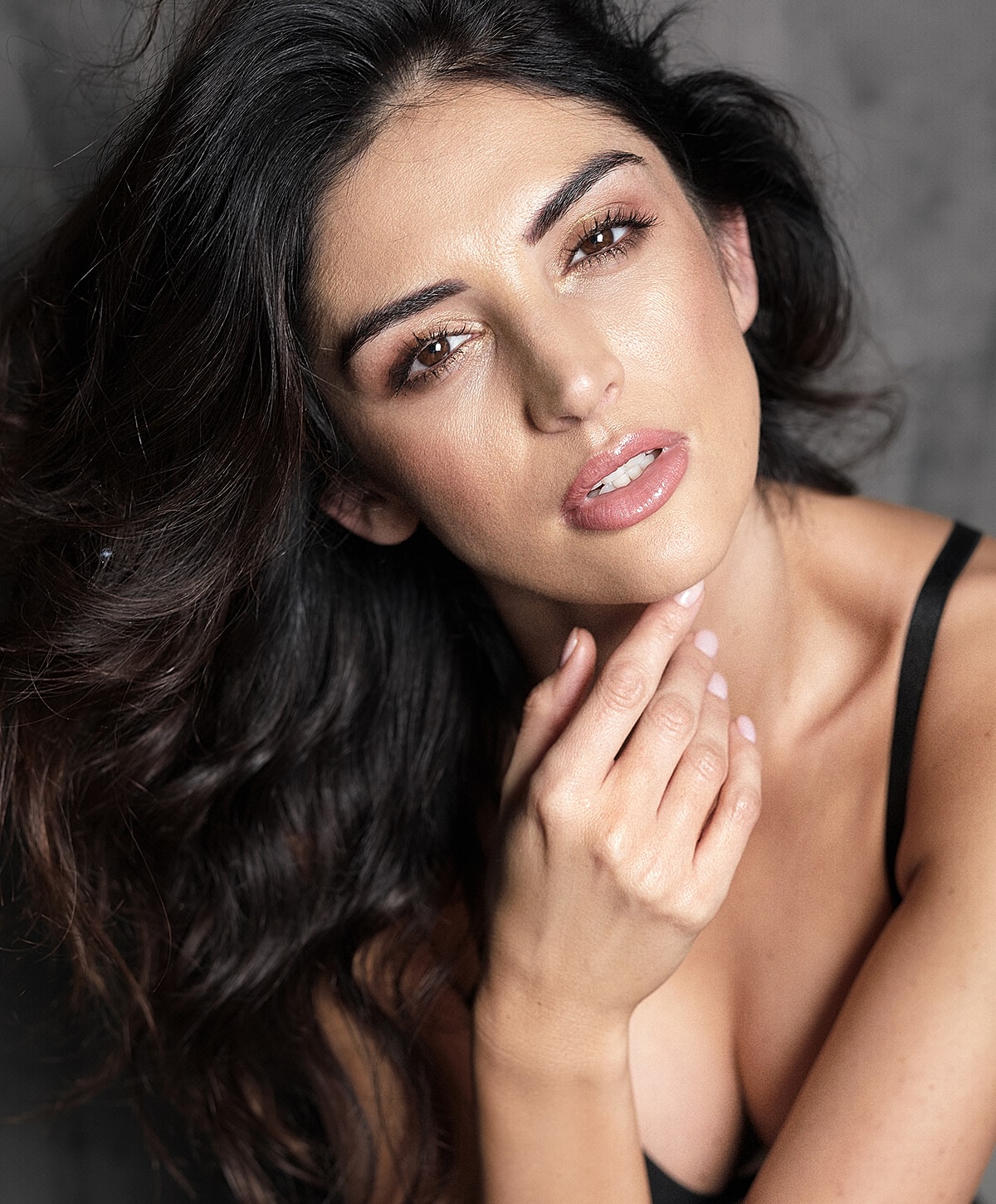 St. Louis Lip Filler model with flowing hair.