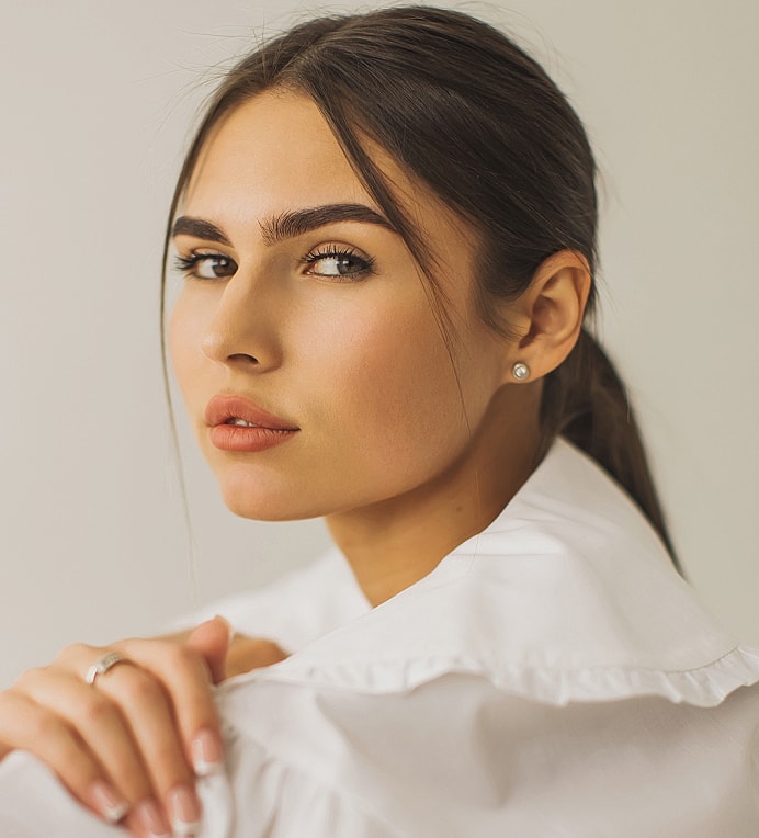 Portrait of a woman with long hair.